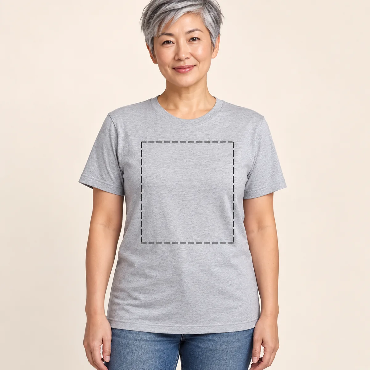 Model wearing a light heather gray Bella + Canvas Ultra-Soft Jersey unisex T-shirt with illustrative print-area boundary.