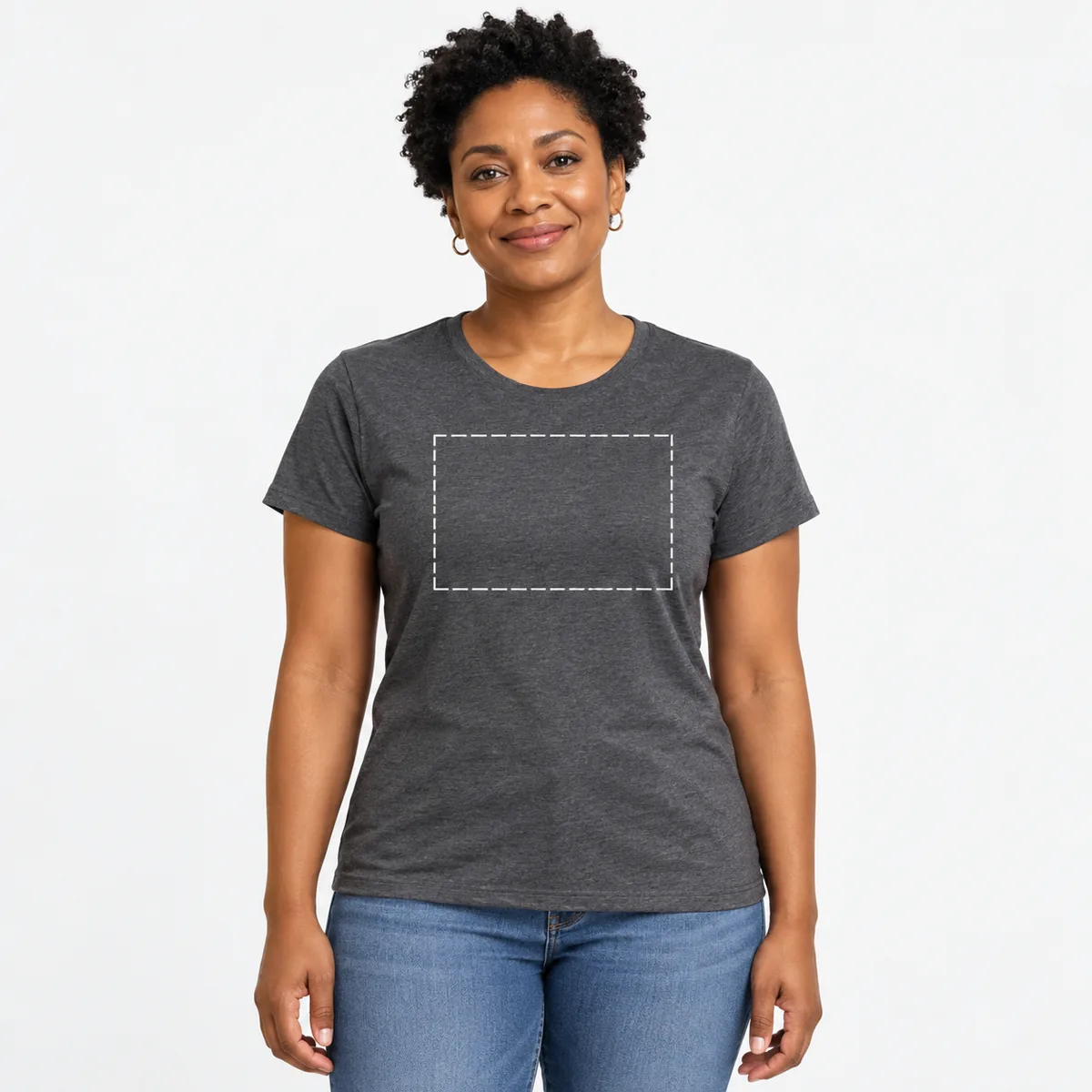 Woman wearing a charcoal District Soft-Touch Women’s T-shirt with an illustrative print-area outline; dimensions are not verified.