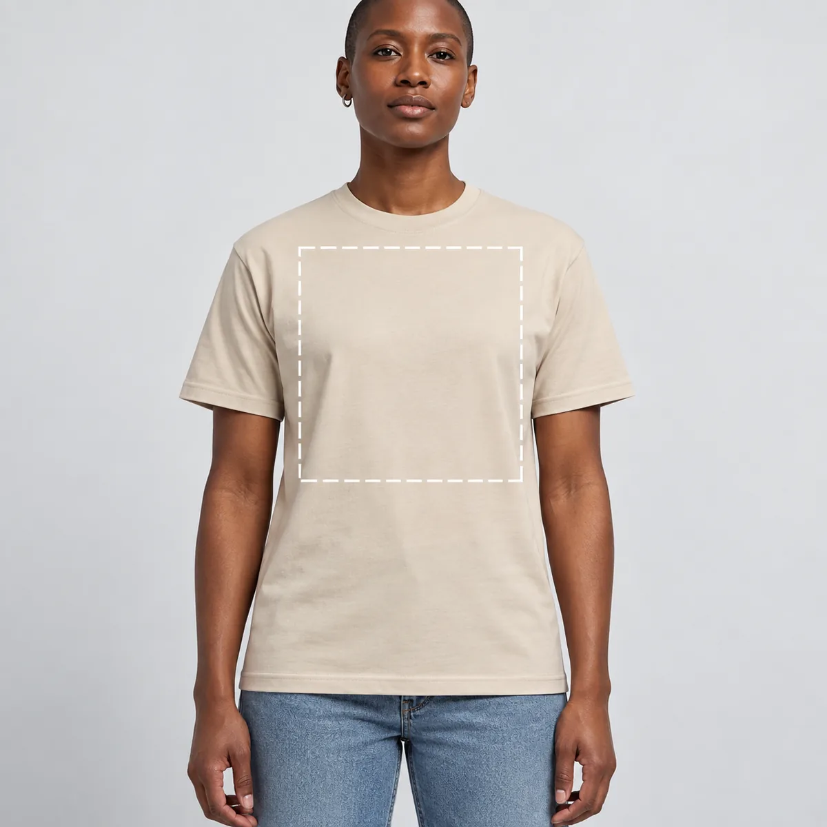 Model wearing a sand Gildan Budget unisex T-shirt with an illustrative, unverified print-area outline.
