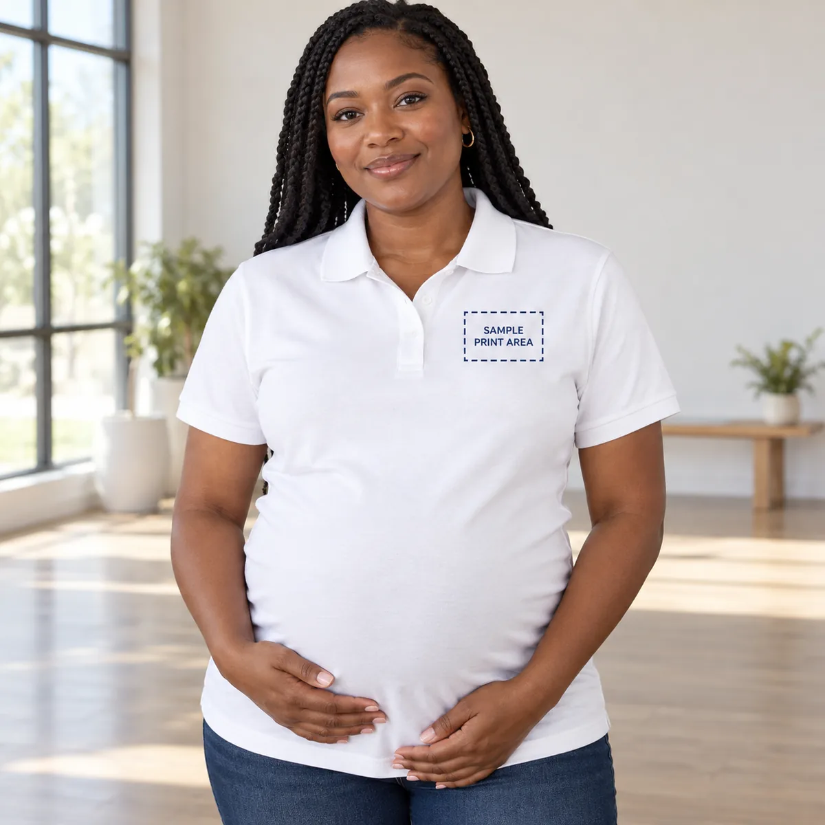 Pregnant Black woman wearing a white Gildan DryBlend polo with an illustrative dashed chest print-area guide; dimensions are not verified.