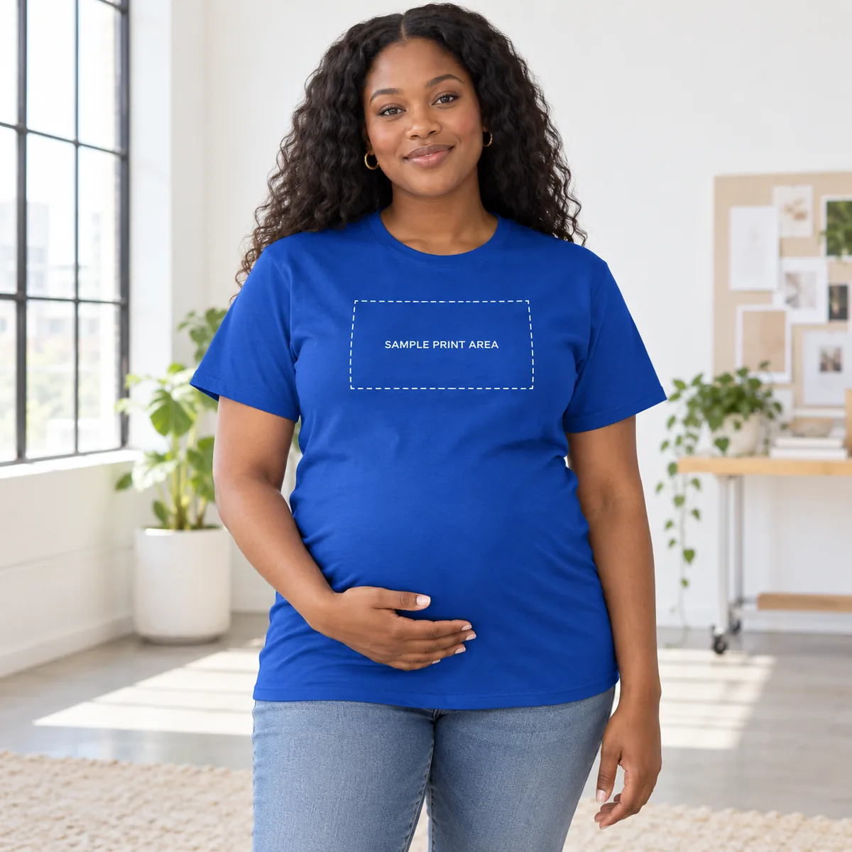 Pregnant Black woman wearing a deep royal Hanes Essential tee with an illustrative chest print-area guide; dimensions are not verified.